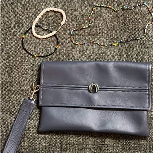 Little vegan leather clutch bag plus with 2 bracelets and a beaded necklace!